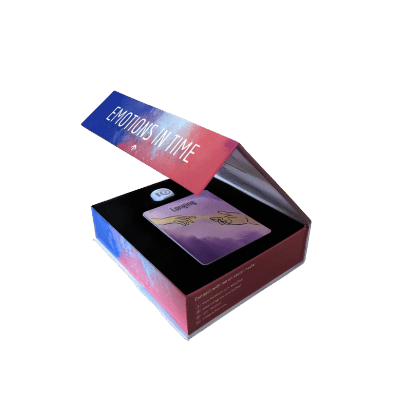 Open box of Emotions in Time therapy cards; featured card suggests longing, ideal for self-reflection and healing.