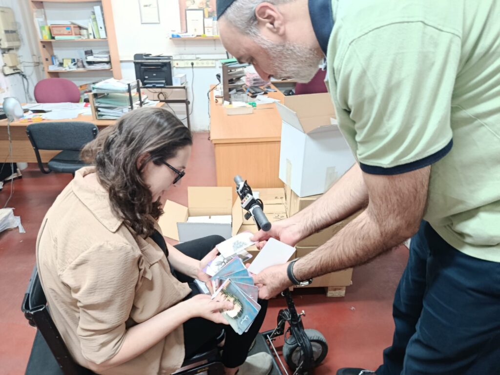 Two people share a heartfelt moment exploring therapy cards, diving into self-awareness and creative healing together.