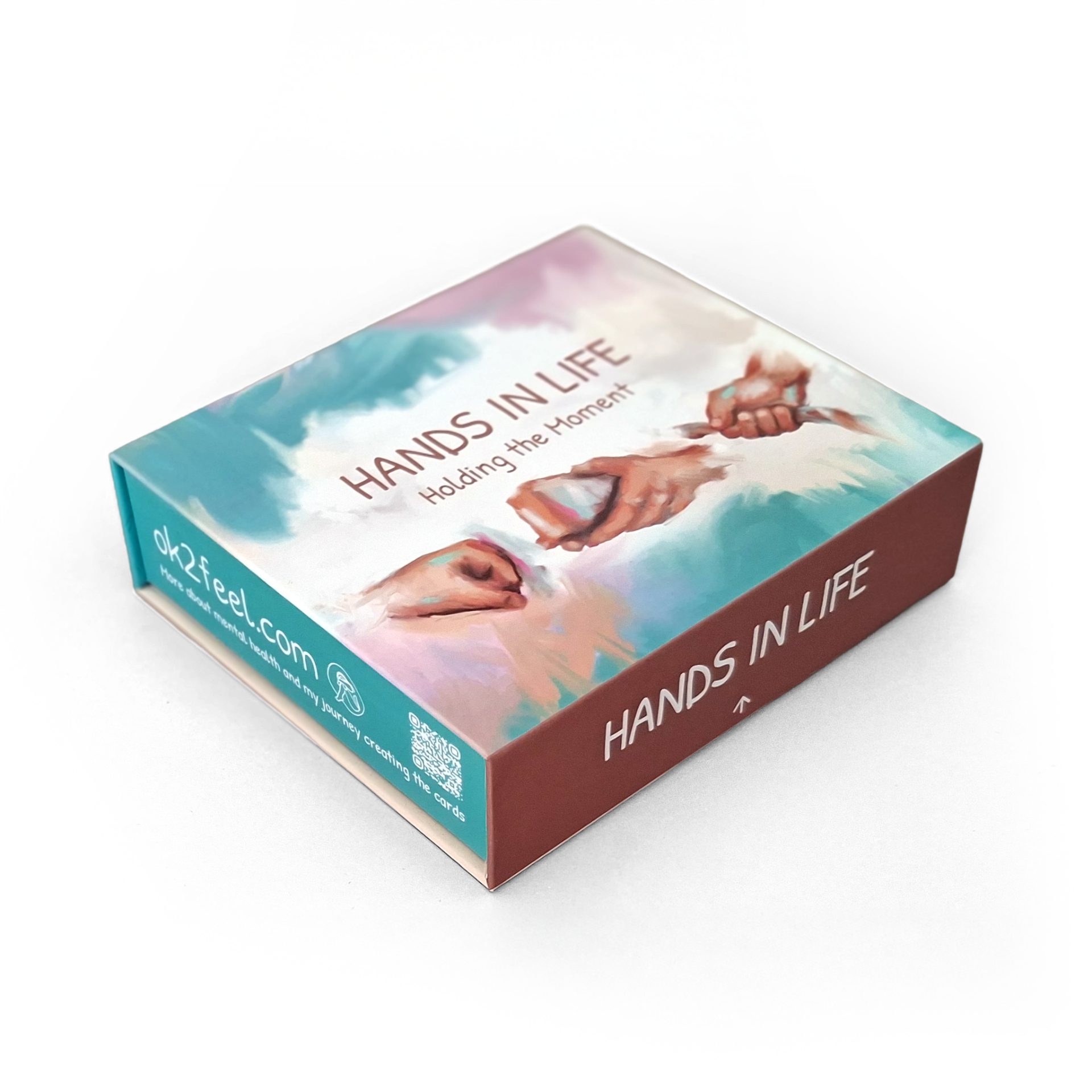 Hands in Life box with illustrated hands holding a stone, symbolizing connection, mindfulness, and emotional support.