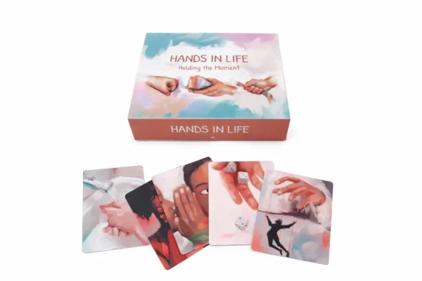 Hands in Life box with illustrated cards